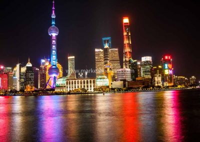 Iconic view of Shanghai’s Pudong skyline taken from the Bund during the evening.