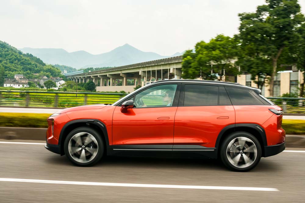 A Nio ES7 Premier Version being driven on an official media test in the area around Dongqian Lake, Ningbo, Zhejiang Province, China.